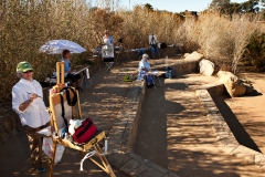 On Friday, October 26, 2012, Carpinteria Plein Air Painters, from left to right, Christine Crooks, Chris Sobell, Babs Runyon, Meg Ricks and Linda Collins paint at the Carpinteria Salt Marsh in Carpinteria, Calif. The group gets together regularly to encourage each other to practice and participate in their craft. (Photo by Victoria Linssen / Brooks Institute © 2012)