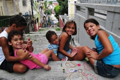 Victoria Linssen; Brooks Institute; Brazil; Escadaria Selarón world-famous steps; Rio De Janerio; Brazil; step; steps; children; pawning goods; selling wares; arts; artists; artists community; smiles; happy children; smiling faces