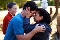 David Swetman and his wife, Bonnie Swetman (left rear) surprise their honored Kumu Hula dance instructor Pilialoha Christiansen with a pre-dance gift at their home in Grass Valley, Calif., on Sunday, October 9, 2011. Christiansen was brought to tears by the gesture. (Photo by Victoria Linssen / Brooks Institute ©2011)
